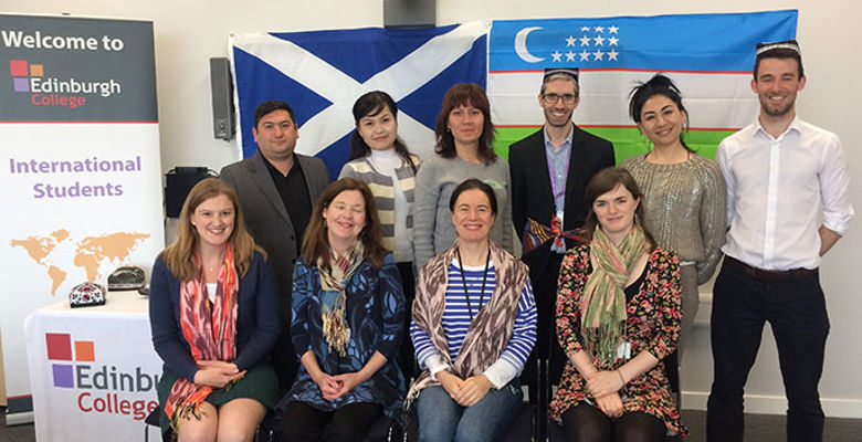 Edinburgh College International team and representatives from Uzbekistan posing for a photo.