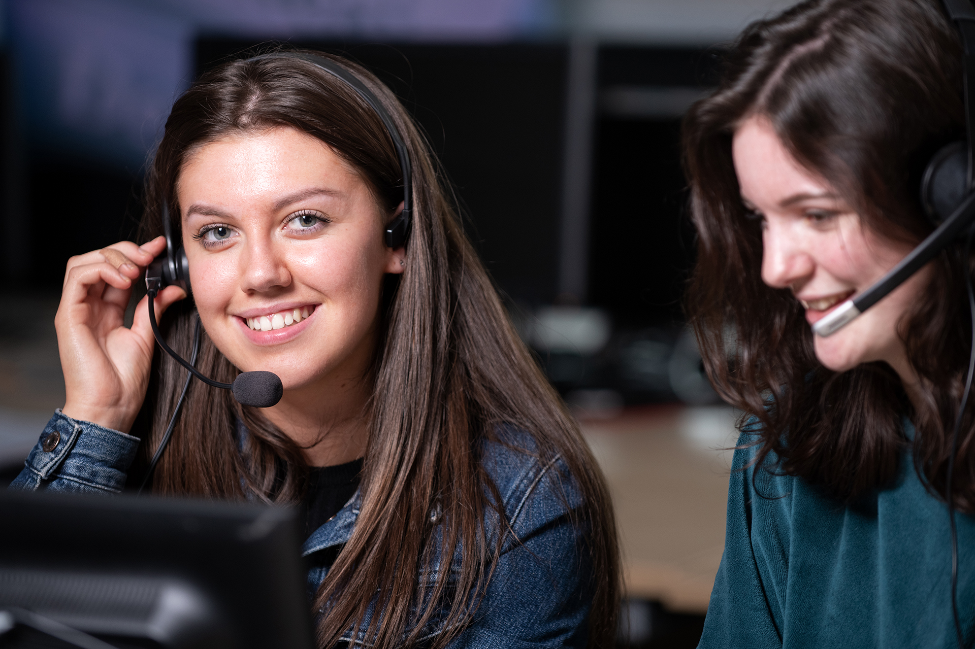 Modern languages students wearing headsets in a classroom.