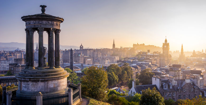 Edinburgh skyline from Calton Hill at sunset.