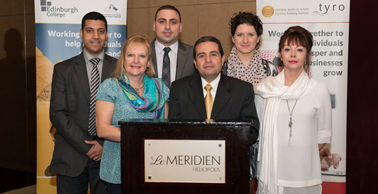 Group of International team representatives standing at a lectern in a conference room in Egypt. 